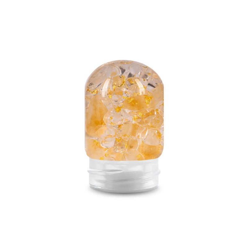 steklenička s kristali zlata